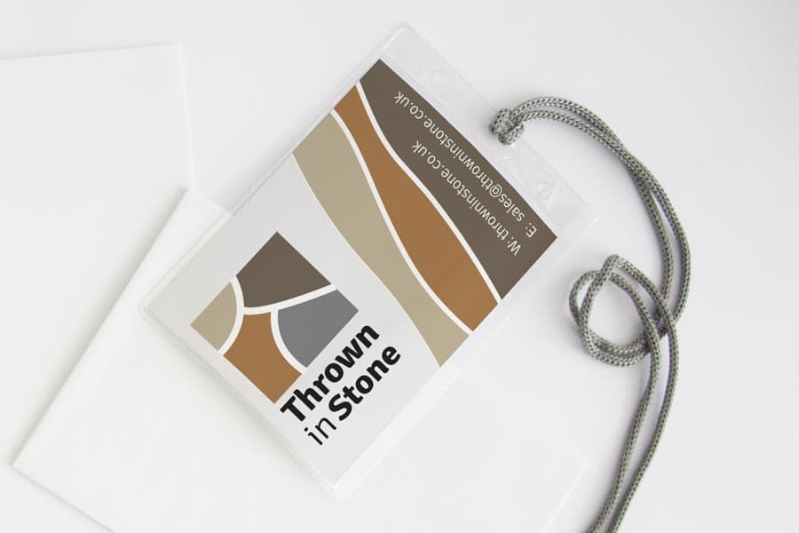 Thrown in Stone Bag Tag